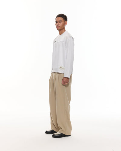 PANTALON À PINCES - SABLE