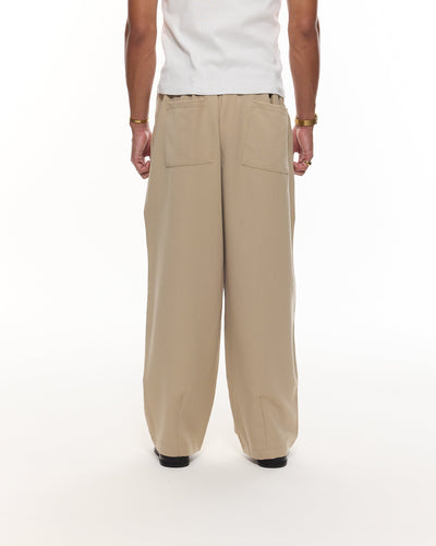PANTALON À PINCES - SABLE
